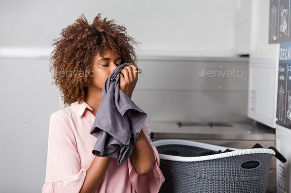 Happy customer with fresh laundry